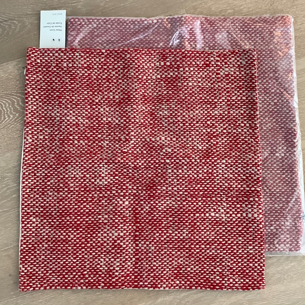 Two West Elm red/tan pillow covers. 20x20